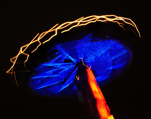 Carnival ride in blurred motion