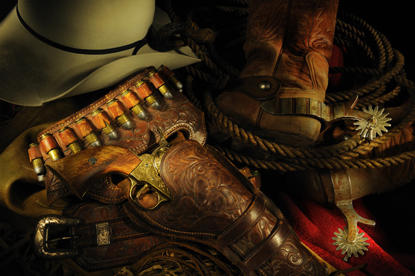 Cowboy Hat, Boots, and Bandolier with Gun in Holster
