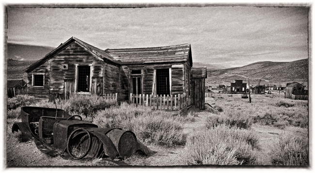 Large Shack with Rusted Car