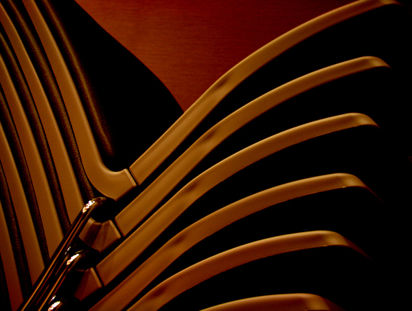 Abstrack-like rendering of stacked  modern chairs 