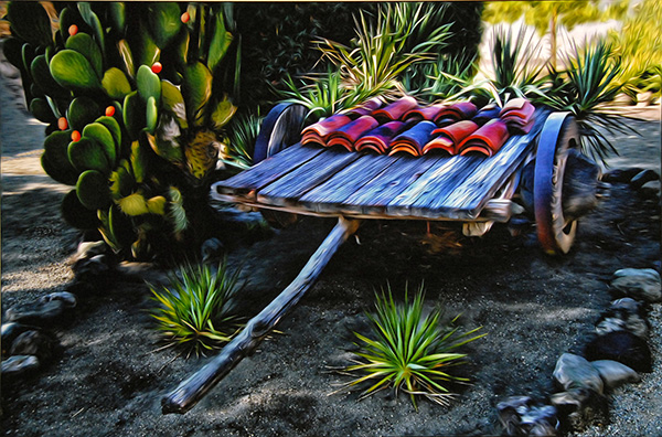 Old cart filled with colorful tiles