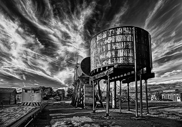 Water tower and train cars