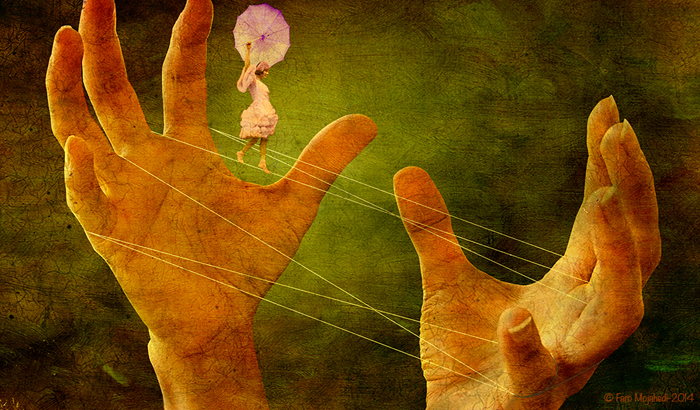 Girl balancing on strings tied between fingers on two hands
